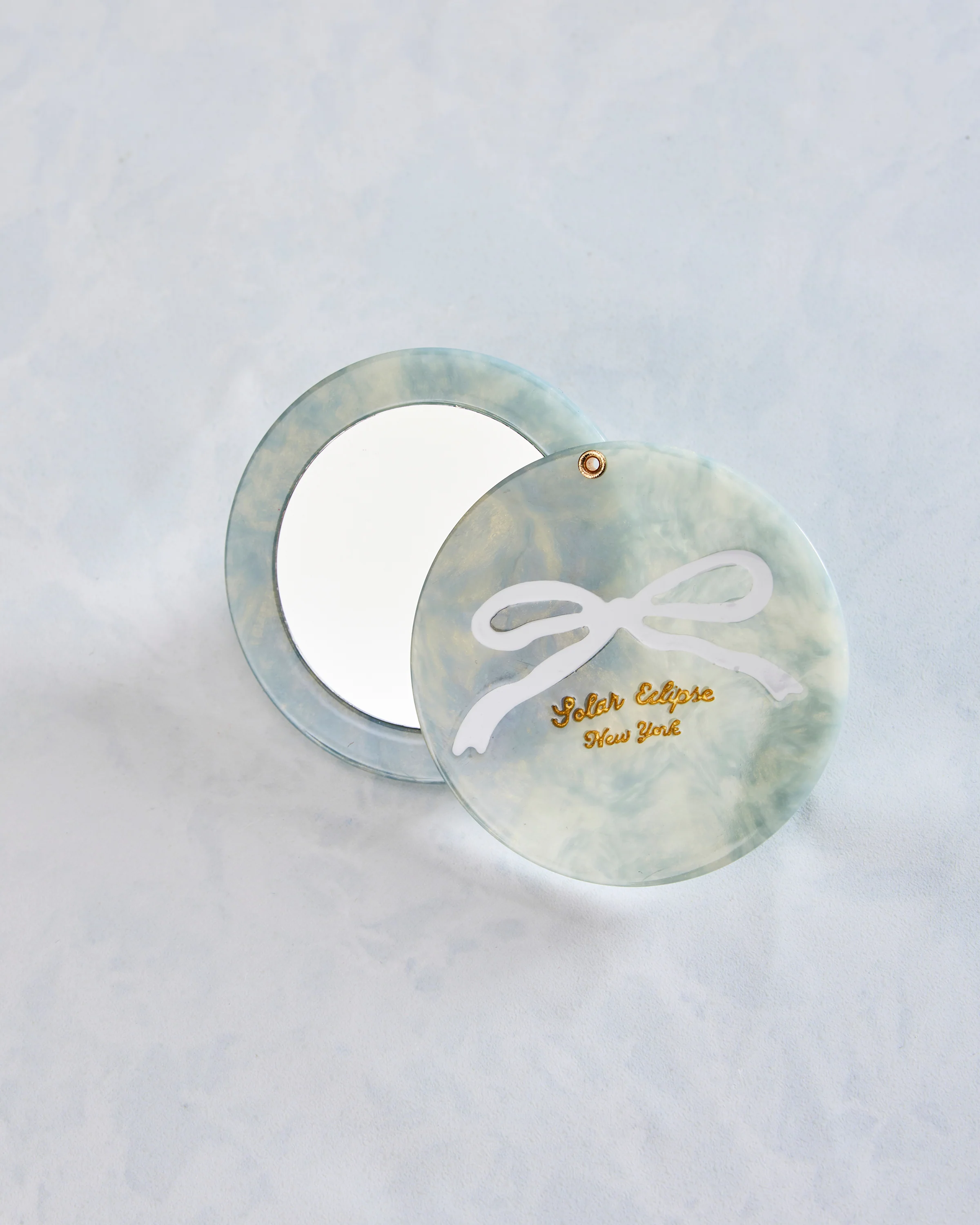 Solar Eclipse - Hand Painted Baby Blue Bow Compact Mirror - Baby Blue